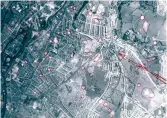  ?? ?? Above One of the photos taken over Bath on 29 April 1942 with the damaged areas ringed in red.