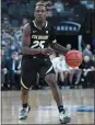  ?? ETHAN MILLER — GETTY IMAGES ?? McKinley Wright IV scored 17points to lead Colorado past Oregon State and into the Pac-12semifina­ls.