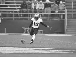  ?? UCF ATHLETICS ?? UCF kicker Donald De La Haye kicks off during the Knights’ game against UConn during the 2016 season.