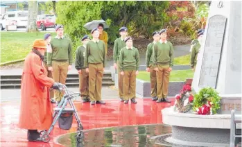  ?? ?? Shirley Goudie lays a wreath at the service marking 104 years since the end of World War I.