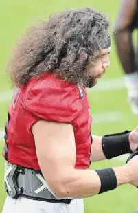  ?? JOHN RENNISON THE HAMILTON SPECTATOR ?? Jeremiah Masoli’s impressive mane drew the immediate attention of his teammates when the Ticats returned to Hamilton for training camp.