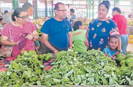 ?? Picture: ANASEINI DIMATE ?? Denise Don browses for fresh vegetables at the Sigatoka Market.
