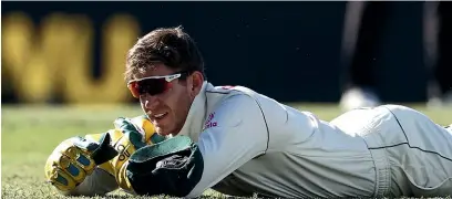  ?? GETTY IMAGES ?? Tim Paine no doubt curses to himself after dropping a catch off Hanuma Vihari during day five of the third test in the series between Australia and India in Sydney.