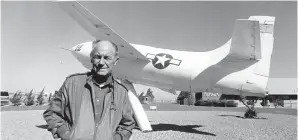  ?? Associated Press ?? ■ This Sept. 4, 1985, file photo shows Chuck Yeager, the first pilot to break the sound barrier in 1947, posing at Edwards Air Force Base, Calif., in front of the rocket-powered Bell X-IE plane that he flew. Yeager died Monday at age 97.