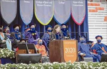  ?? Mike Groll / Courtesy of the Executive Chamber / Office of Governor Kathy Hochul ?? During a commenceme­nt speech at Syracuse University, Gov. Kathy Hochul told stories about her family, pizza, protests at school and her father hoping that one day she would be a member of Congress.