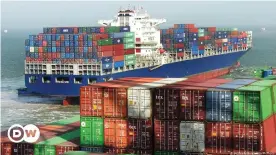  ??  ?? Container ships keep global trade going