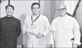  ??  ?? Rep. Strike Revilla (center) with Letran’s Fr. Boyd Sulpicio (left) and Fr. Clarence Victor Marquez.