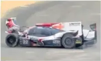  ??  ?? COSTLY Di Resta’s wrecked car spins across Le Mans track