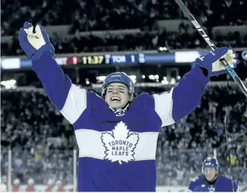  ?? JACK BOLAND/POSTMEDIA NETWORK ?? Toronto Maple Leafs’ Mitch Marner celebrates a goal during the Centennial Classic.
