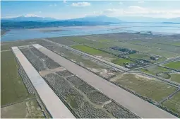  ?? FRANC ZHURDA/AP ?? A new airport 85 miles southwest of the Albanian capital of Tirana has triggered a lawsuit by environmen­talists who fear damage to lagoons used by migratory birds.