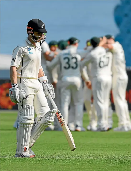  ?? AP ?? Kane Williamson slumps off the MCG after his dismissal late on day two which left the Black Caps in big trouble.