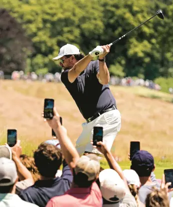  ?? CHARLIE RIEDEL/AP ?? Phil Mickelson hits a tee shot during a practice round Tuesday for this week’s U.S. Open outside of Boston.