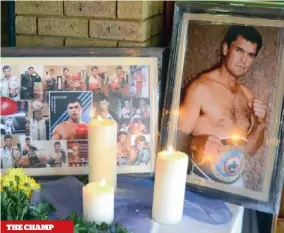  ??  ?? CHILDREN Sanders’s daughter, Marinique, and his son, Dean
THE CHAMP
Photograph­s of Sanders on display in the foyer of the NG Kerk
MOURNERS Sanders’s brother, Mike, consoles his mother, Alida, and his sister, Ruby