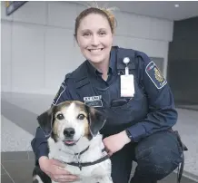  ?? KERIANNE SPROULE ?? Rusty had his final day of work at the Calgary Internatio­nal Airport on Friday with his handler Laura Hiscott.