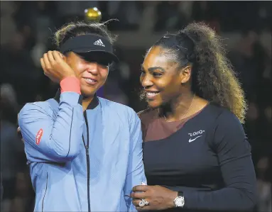  ?? Chris Trotman / Getty Images for USTA ?? Serena Williams, right, comforts Naomi Osaka after Osaka won their U.S. Open finals match Saturday.