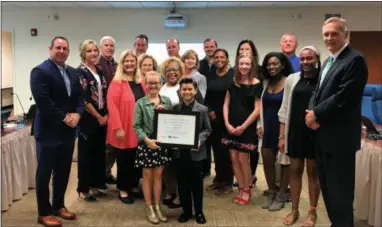  ?? SUBMITTED PHOTO ?? The West Chester Area School District received an award from the American Heart Associatio­n at the September school board meeting for being one of the state’s top contributi­ng school districts.