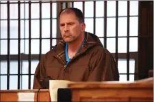  ?? STUART CAHILL — BOSTON HERALD ?? Winthrop police officer James Feeley is arraigned on charges of rape of a child at East Boston District Court on Dec. 27.