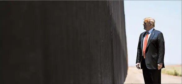  ?? EVAN VUCCI/AP ?? President Donald Trump tours a section of border wall in San Luis, Arizona, last Tuesday. A federal appeals court has ruled against his administra­tion.