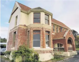  ?? PHOTO: SUPPLIED ?? The southeast wall when the owners took possession. After replasteri­ng the wall and replacing rotten window frames, they left the dining room in behind to dry out over summer, then redecorate­d.