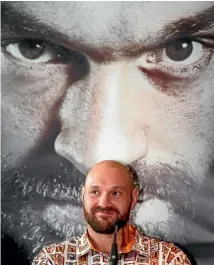  ?? ALEX LIVESEY/GETTY IMAGES ?? Tyson Fury looks on during a press conference in Manchester. He is due to make his competitiv­e comeback on June 9.