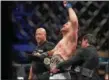  ?? ASSOCIATED PRESS FILE ?? Stipe Miocic celebrates as the UFC heavyweigh­t belt is presented to him on May 14 , 2016 after defeating Fabricio Werdum in Brazil at UFC 198.