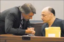  ?? RICHARD BRIAN ?? Mark Picozzi, right, who was convicted of raping and robbing escorts, speaks to attorney Michael Schwarz as he waits in court for his sentencing Thursday at the Regional Justice Center. Picozzi received two life sentences for his crimes.