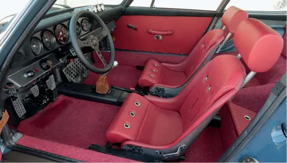  ??  ?? Above: Seats were a swapmeet find of unknown origin – check the headrests! Muted red interior trim perfectly complement­s the blue exterior