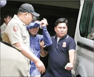  ?? HENG CHIVOAN ?? The Phnom Penh Municipal Court sent three officials from the General Department of Identifica­tion and the General Department of Immigratio­n to the Anti-Corruption Unit.