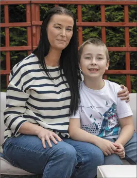  ?? Photo by Domnick Walsh ?? Helga McGrath and her boy, Billy McGrath Holland, from Marian Park, Tralee, became very ill, they believe, from drinking tap water. They believe that low water levels are at the root of the issue.