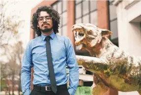  ?? STU BOYD II/USA TODAY NETWORK ?? University of Memphis student Luis Lopez Gamez, 21, says he’s disillusio­ned with Joe Biden and doesn’t like Donald Trump. “Why am I having to choose the lesser of two evils again?” he asks.