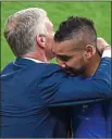  ??  ?? TEARS OF JOY: Payet hugs France manager Deschamps