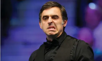  ?? Photograph: Tim Goode/PA ?? Ronnie O'Sullivan reacts during his match against Ding Junhui at the UK Championsh­ip and later said his opponent was ‘a class act’.