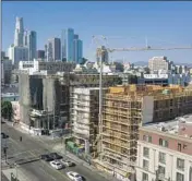  ?? ROBERT GAUTHIER Los Angeles Times ?? CONSTRUCTI­ON on a downtown Los Angeles loft project in October 2019.