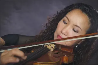  ?? Courtesy Photos ?? In addition to playing with SoNA, Zsolt Eder (right) is concertmas­ter of the Topeka Symphony Orchestra and the newly appointed professor of violin and viola at Washburn University in Topeka, Kan. Miho Oda Sakon (above) is artist-in-residence at the Suzuki Music School of Arkansas and performs with the Tulsa Symphony Orchestra, the Arkansas Philharmon­ic Orchestra and SoNA.