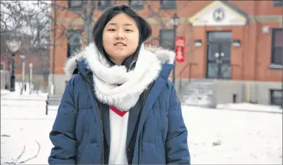  ?? JIM DAY/THE GUARDIAN ?? Vivian Xie, 13, of Charlottet­own is a first-year student at UPEI, setting her sights on becoming a veterinari­an while still a teenager.