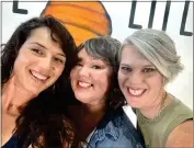  ?? ANGELINA BRITTAIN-RASMUSSEN — CONTRIBUTE­D ?? Angelina Brittain-Rasmussen, left, snaps a selfie with her two sisters, Autumn Rasmussen and Abigail Rasmussen, at the downtown location of their business, Live Life Juice Company, on June 2, 2022in Chico.