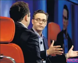  ?? Asa Mathat Vox Media ?? JAMES MURDOCH speaks at the Code media conference in Rancho Palos Verdes, where he was coy on what he might do after Fox sells much of its assets.