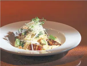  ?? RICHARD LAUTENS PHOTOS TORONTO STAR ?? Shiso Tree Cafe’s fettuccine with yuzu kosho cream sauce, avocado, garlic chips, shiso and unagi.