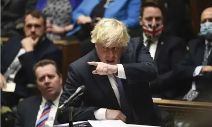  ?? Photograph: Jessica Taylor/AP ?? Boris Johnson in the Commons on Wednesday. A new weekly limit on paid ‘outside’ jobs could still leave many MPs earning high wages for very few hours’ work.