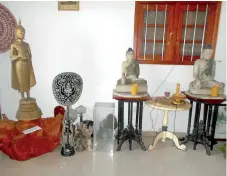  ??  ?? Ven. Walatara Sobhitha’s collection includes old statuettes and other artefacts