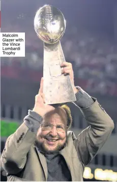  ??  ?? Malcolm Glazer with the Vince Lombardi Trophy