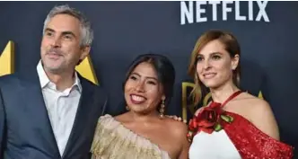  ??  ?? In this file photo Mexican director Alfonso Cuaron (left), Mexican actress Yalitza Aparicio (center) and Mexican actress Marina de Tavira (right) arrive for the Los Angeles premiere of “Roma” at the Egyptian theatre in Hollywood, California. — AFP photos