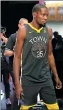  ??  ?? Kevin Durant of the Golden State Warriors models the team’s new alternate jersey on Sept 15 in Los Angeles.