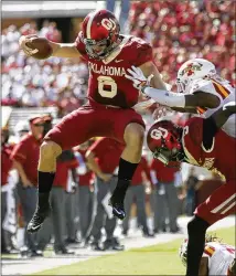  ?? SUE OGROCKI / AP ?? Texas needs to copy Iowa State’s plan and put a few hits on Sooners QB Baker Mayfield. “I know why he’s a top Heisman candidate — because he can really play,” UT’s DeShon Elliott said.
