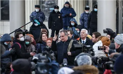  ?? Wednesday. Photograph: Mikhail Tereshchen­ko/Tass ?? Alexander Cherkasov, centre, the head of the Memorial Human Rights Centre, talks to journalist­s outside the Moscow city court on