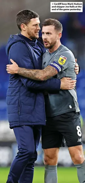  ?? ?? > Cardiff boss Mark Hudson and skipper Joe Ralls at the end of the game yesterday