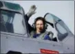  ?? — ASSOCIATED PRESS FILE PHOTO ?? MATT YORK Rep. Martha McSally, R-Ariz., leaves in a T-6 World War II airplane after speaking at a rally in Phoenix. Women with military experience — many of them combat veterans — are among the record number of female candidates running for office this year.