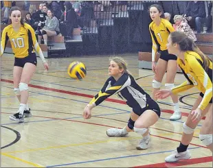  ??  ?? SunDogs libero Taylor Doerksen digs the ball against the 18U Wildfire round robin game, March 2.