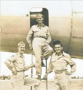  ??  ?? A B-29 CRASHED in a remote, mountainou­s region of China in 1944, with crew including Lt. Garl Bud Ray, left, Lt. Charles Gray and Sgt. Virgil Bailey.