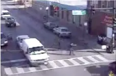  ??  ?? A Chicago Police Officer draws his gun in a still frame from a video that shows the shooting of Cedrick Chatman by Chicago Police.